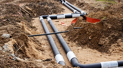 Underground Utility Pipes for New Construction Plumbing Installation